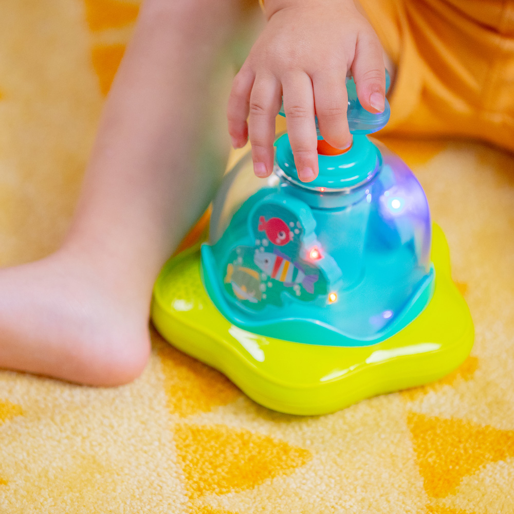 BRIGHT STARTS Hračka hudobná svietiaca Press&Glow Spinner 6m+