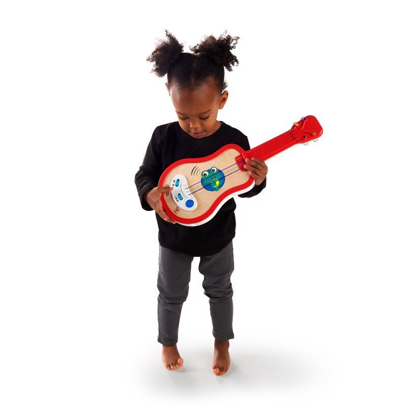 BABY EINSTEIN Drevené ukulele Magic Touch HAPE 12m+