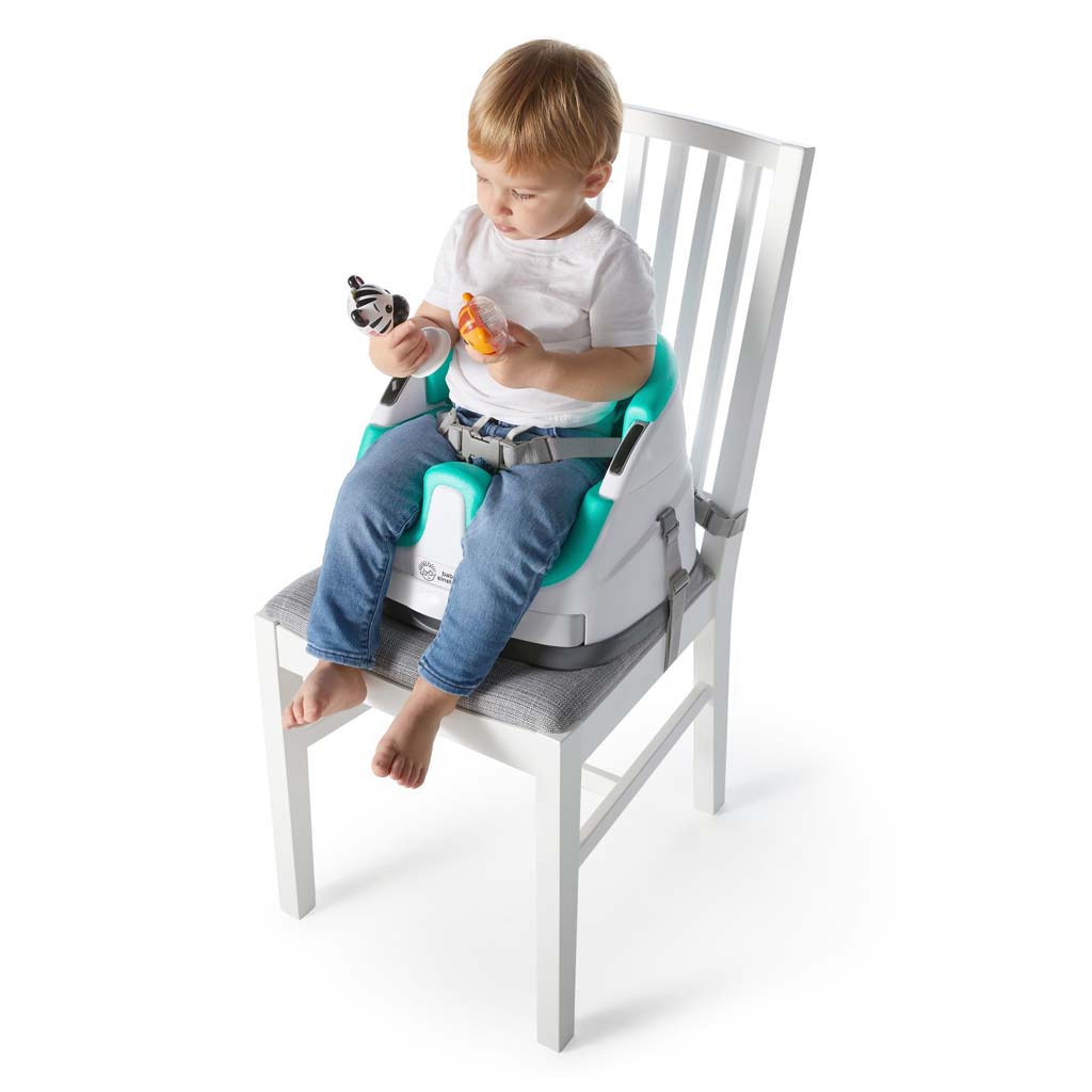 BABY EINSTEIN Podsedák na židli s 2 hračkami 2v1 Dine&Discover 6m+ do 23 kg