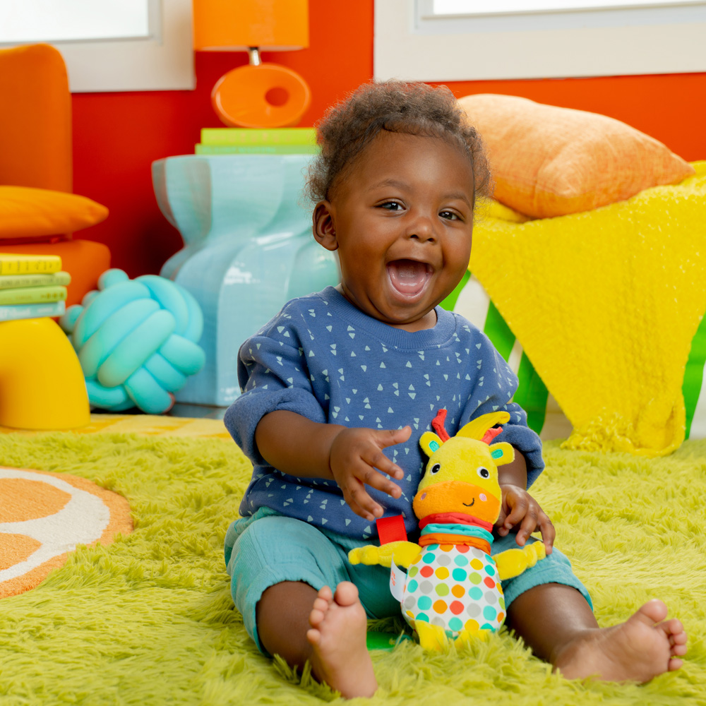 BRIGHT STARTS Hračka s melodií na C kroužku Pull, Play & Boogie™ žirafa 0m+