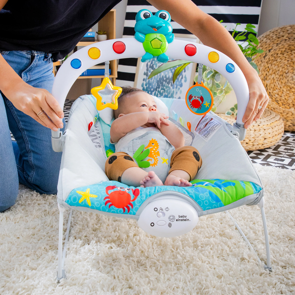 BABY EINSTEIN Lehátko hudobné vibračné so svetielkami Kick to It Neptune do 9 kg