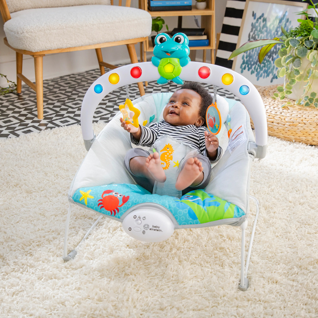 BABY EINSTEIN Lehátko hudobné vibračné so svetielkami Kick to It Neptune do 9 kg