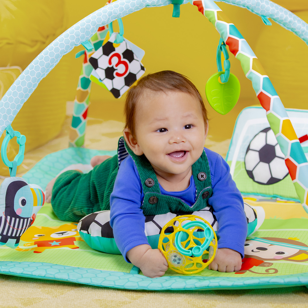 BRIGHT STARTS Deka na hranie s aktivitami Oball Grip & Kick™ 0m+