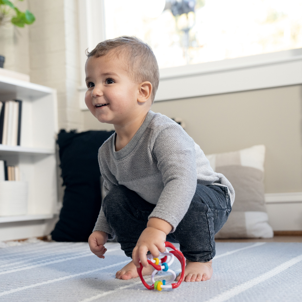 BABY EINSTEIN Hračka lopta senzorická Slide & Swirl™ 3m+