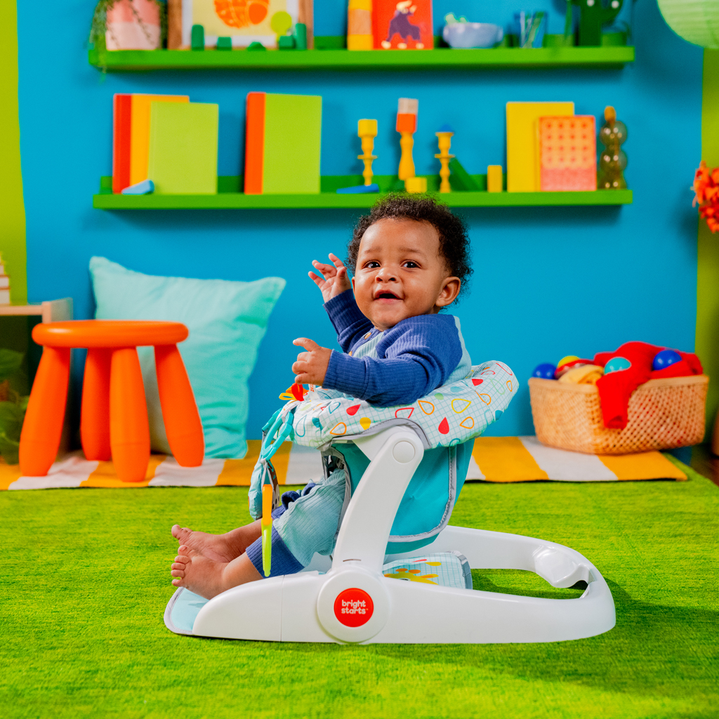 BRIGHT STARTS Kresielko učiace s hračkami pripravené na cestovanie Learn-to-Sit™, 4m+