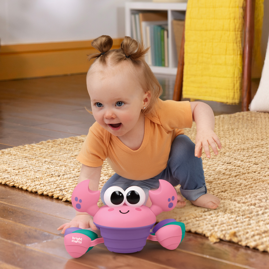 BRIGHT STARTS Hračka hudobná a multisenzorická Rockin' Crawling Crab™ - Pink, 6m+
