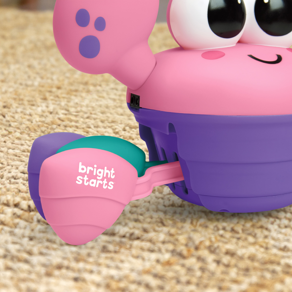 BRIGHT STARTS Hračka hudobná a multisenzorická Rockin' Crawling Crab™ - Pink, 6m+