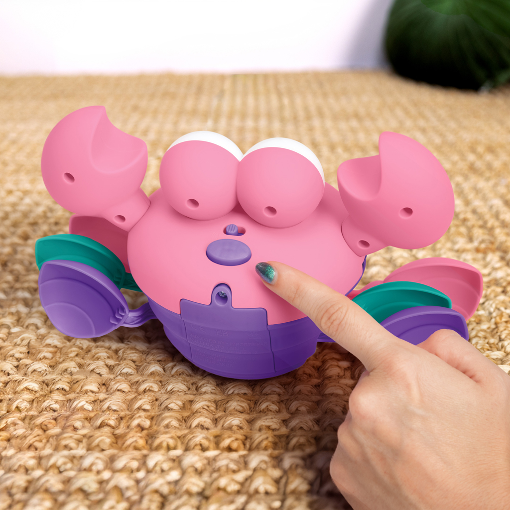 BRIGHT STARTS Hračka hudobná a multisenzorická Rockin' Crawling Crab™ - Pink, 6m+