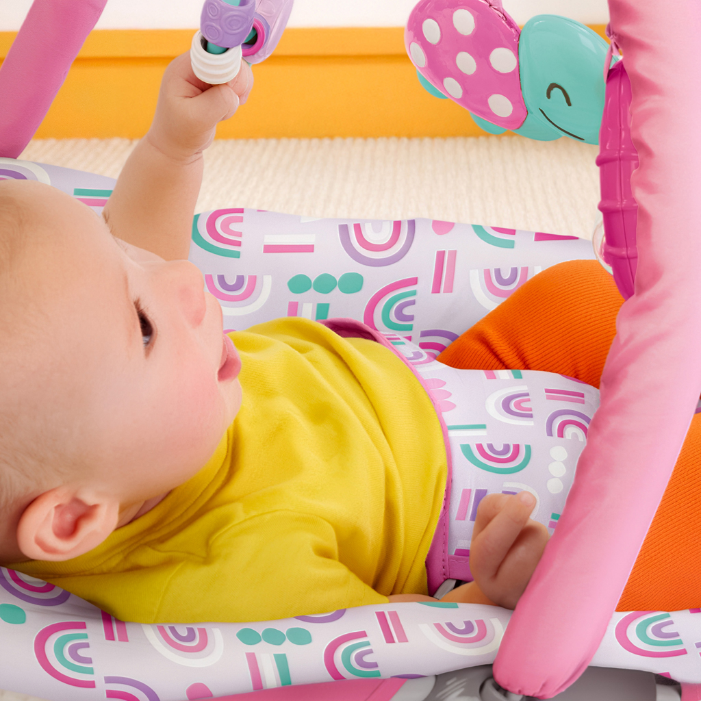 BRIGHT STARTS Lehátko s hračkami Confetti Rainbow™ Bouncer, 0m+