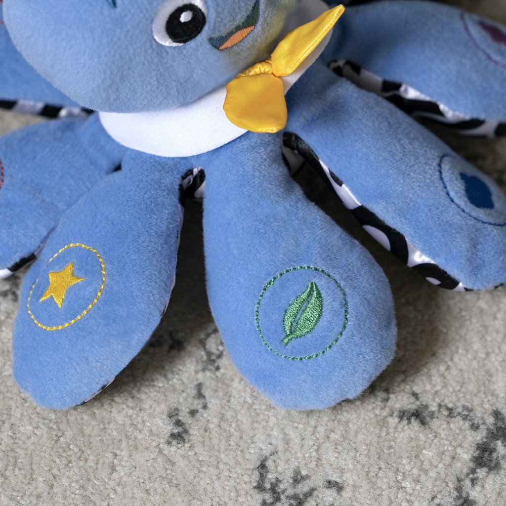 BABY EINSTEIN Hračka hudební chobotnice Octoplush™ 3m+