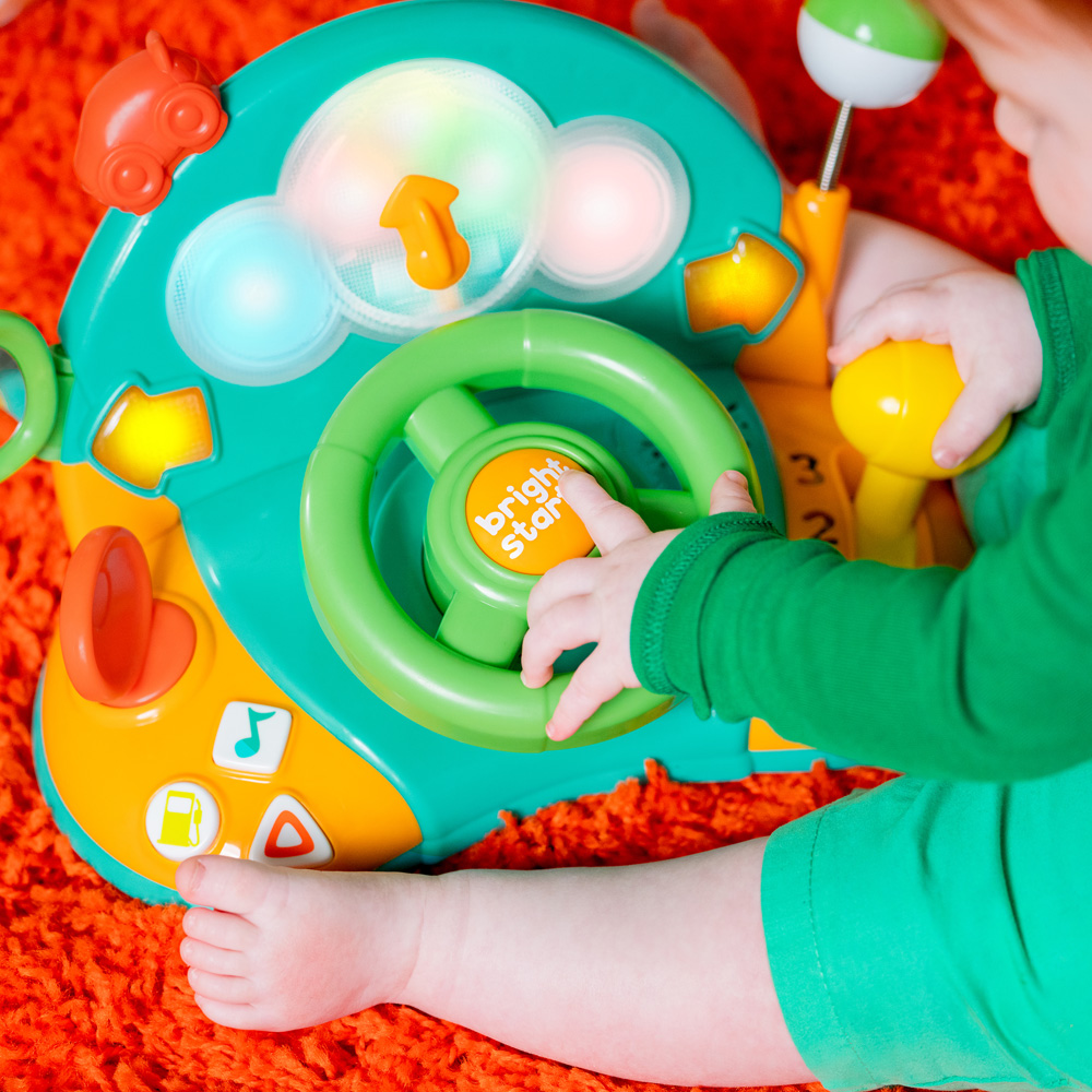 BRIGHT STARTS Hračka hudobná svetelná volant Lights&Colors Driver™ 6m+