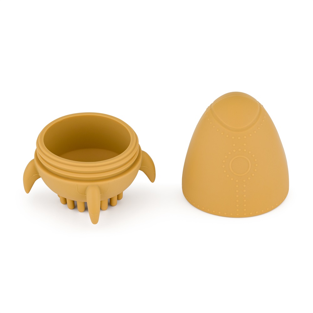 PETITE&MARS Hračka silikonová do vody s kartáčkem Splashy Rocket Intense Ochre 6m+